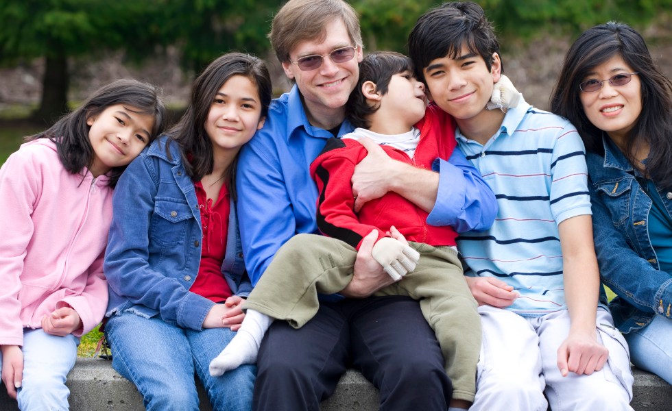 Happy family enjoying day at park
